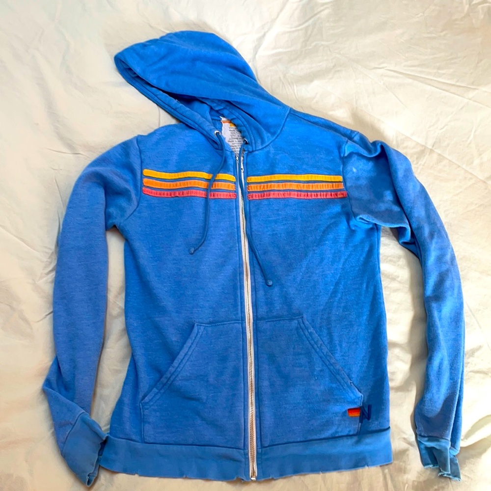 Aviator Nation blue hoodie sweatshirt with vintage rainbow print. Size small.